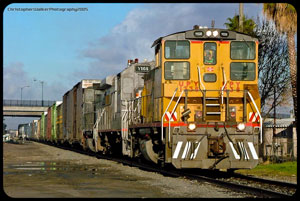 UP 1338 pulling out a couple of box cars from the east end of the Long Pass siding gathering cars for the days HB Switcher - January 5th 2005