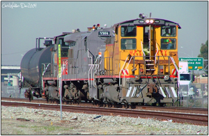 UP 1338 alongside the Long Pass siding with a lone tank car - December 01 2004