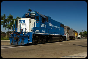 GMTX 2146 dragging a late afternoon Marlboro Local back to West Anaheim. Seen here crossing Manchester Ave - August 6th 2007