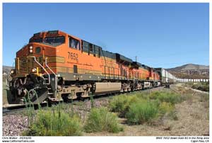 BNSF 7652, a GE ES44DC brings a JB HUnt stack train down M2.