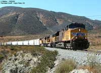 UP 5783 dragging a mixed manifest up the grade heading towards Swarthout Canyon.