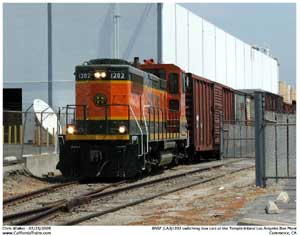 BNSF 1202 which is used exclusivley by the LAJ Railroad is seen here east of Eastern Ave switcing box cars for one of their customers.