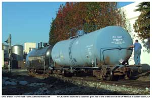 The LOA32 takes four loaded tank cars across Monarch Street to spot them on the spur for Goodwin and pull out the empty cars. 