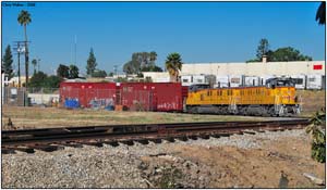 UPY 2720 on the LOA36R "Fullerton Local" shoving box cars into HD warehouse on Imperial Hwy at Harbor Blvd.