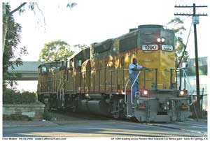 UP 1090 at Pioneer Ave heading for Los Nietos yard with a conductor riding the point.