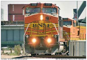 BNSF 505 running with light engines through CP Dominguez just off Terminal Island. The Alameda Corridor can be seen directly in the background with a stack train coming off the island.