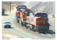 The BNSF engine power for their interchange train MWCLBAR came east along the outside track